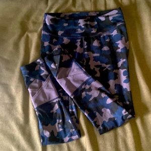 Girls purple camouflage print leggings.